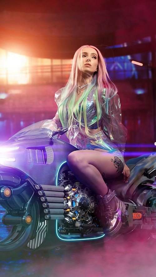 Sci-fi biker woman with pink and green hair on a futuristic motorcycle