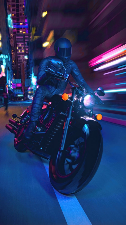 Biker riding a motorcycle through a neon city at night