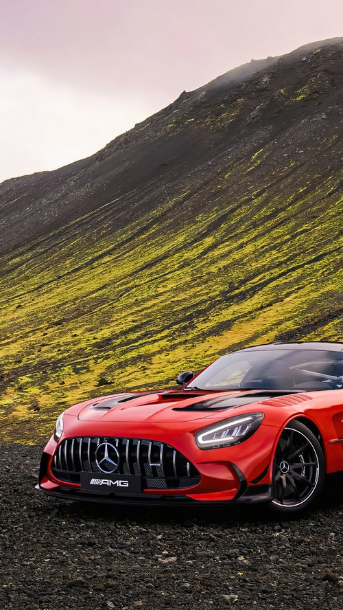 Red Mercedes-AMG GT R on a rocky terrain