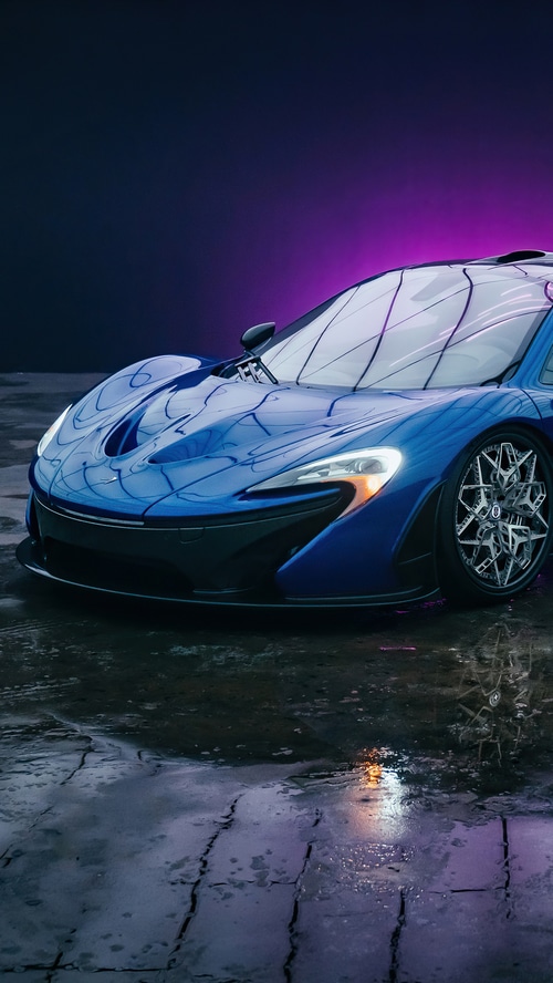 Blue McLaren P1 on wet ground