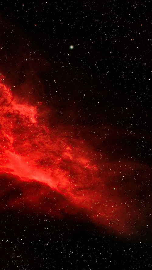 Red nebula and stars in deep space