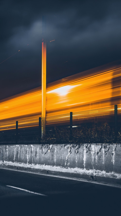 Long exposure photography of a train at night