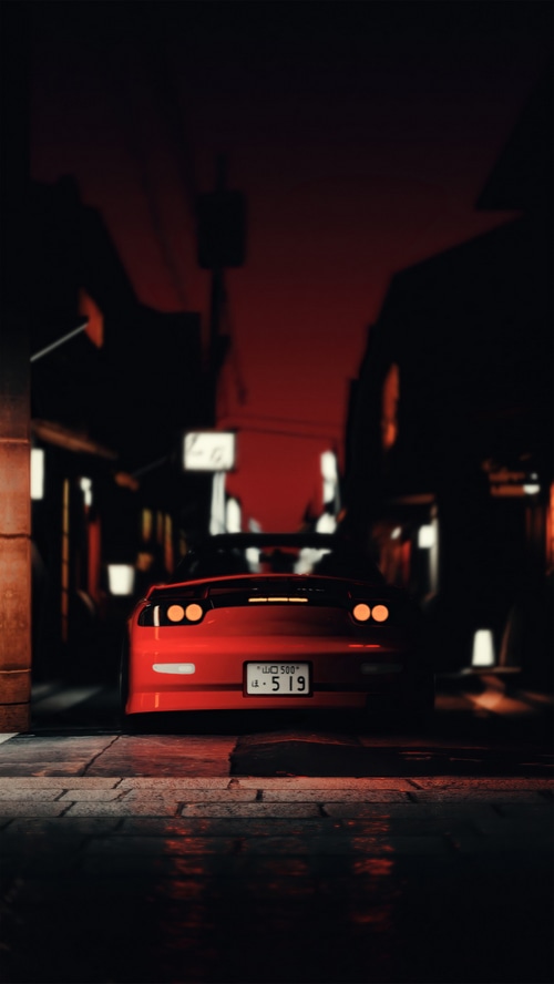 Red Mazda RX-7 in a dark alley