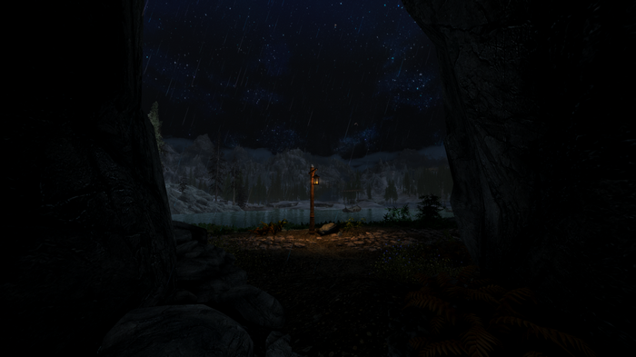 The Elder Scrolls V: Skyrim night landscape with rain and stars