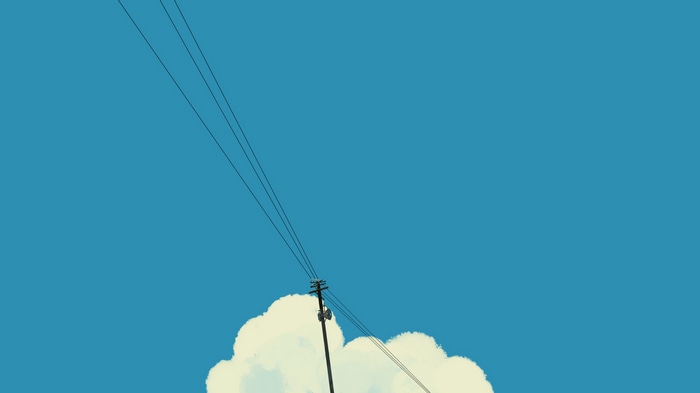 Blue sky with clouds and utility pole
