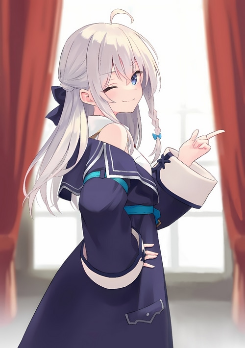 Elaina winks and points in a dark blue outfit