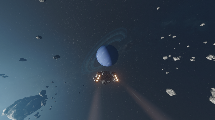 Starfield spaceship near a ringed planet
