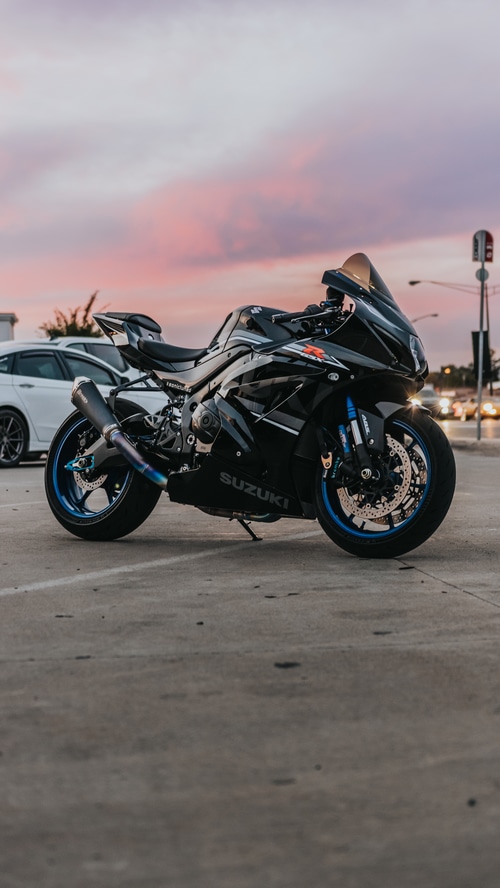 4K Suzuki GSX-R motorcycle parked at sunset