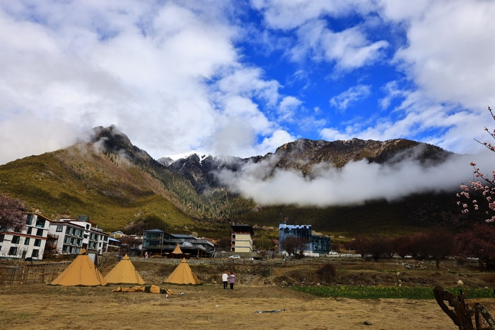 Tibet, China: Mountains, Clouds, and Tents