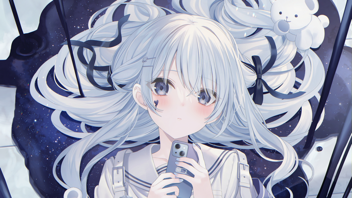 Girl with blue hair holding a smartphone