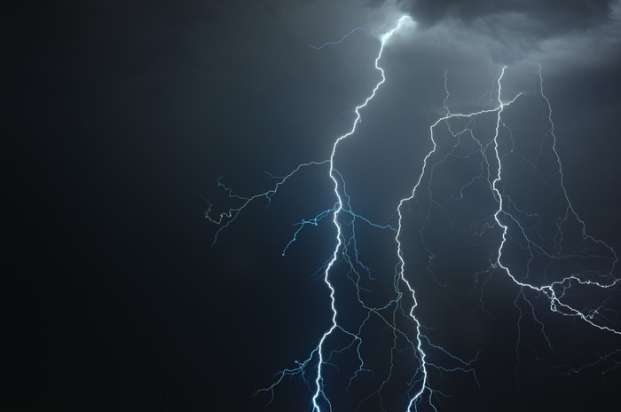 4K lightning strikes in a stormy night sky