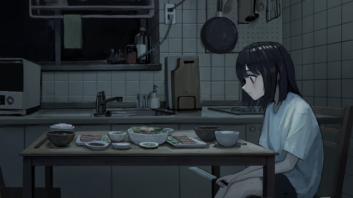 Girl with knife at kitchen table