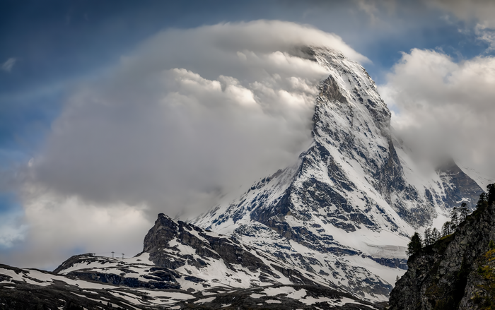 The Matterhorn mountain shrouded in clouds