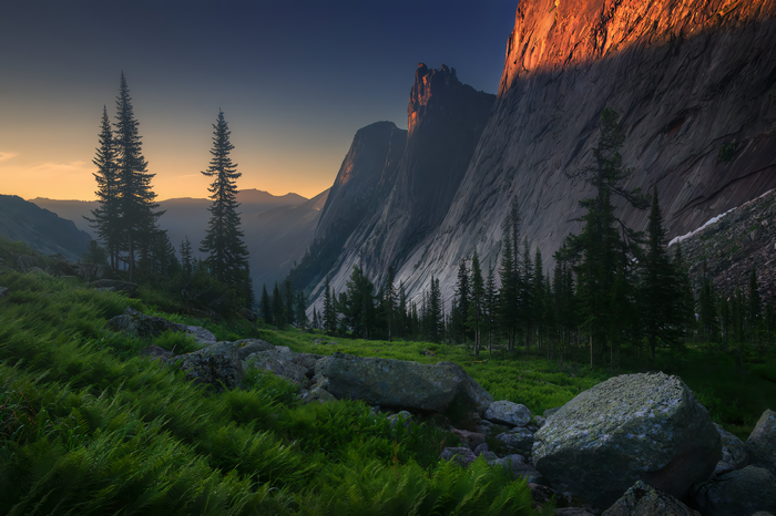 Sunset over mountains and forest in Russia
