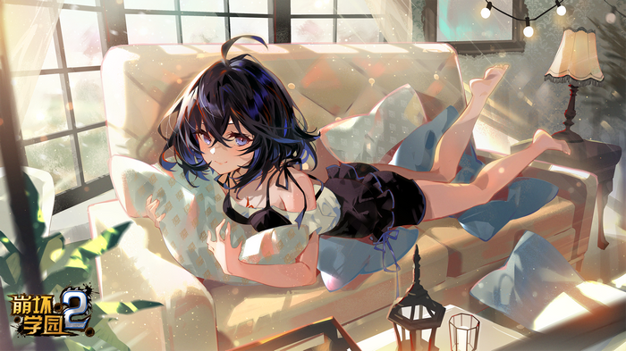 Seele Vollerei on a couch with pillows and sunlight