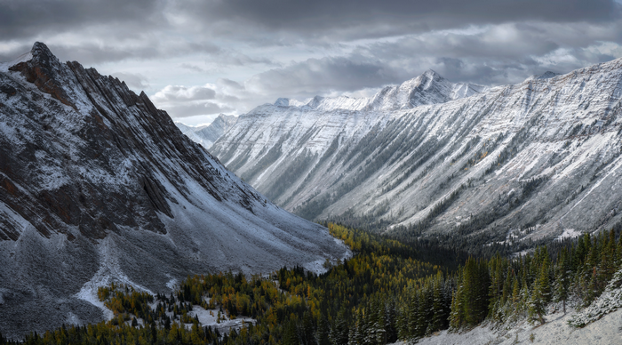 Snow-covered mountains and autumn trees in Canada