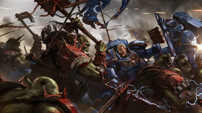 Warhammer 40,000: Ultramarines fighting Orks