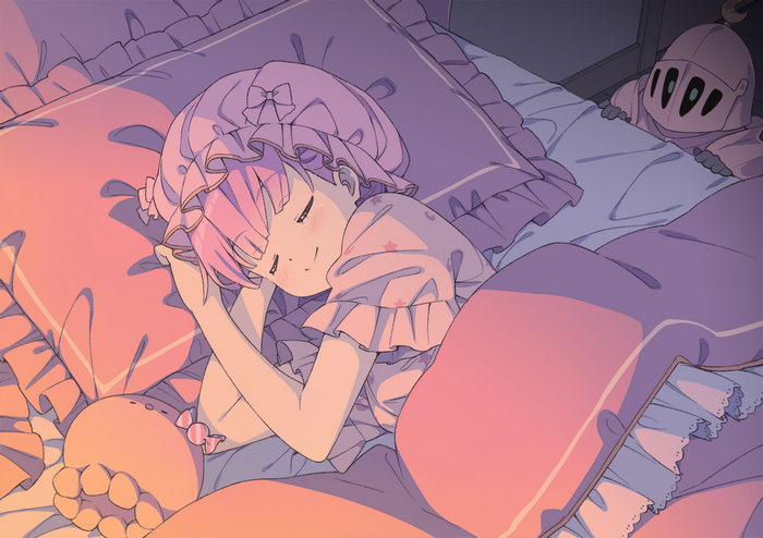 Girl in pajamas sleeping with a toy and a creature