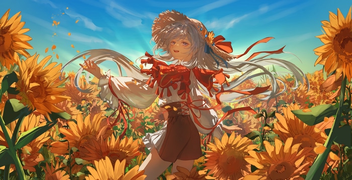 Girl in straw hat in sunflower field