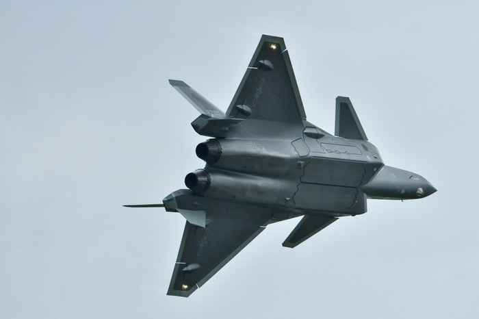 Chengdu J-20 fighter jet flying in the sky