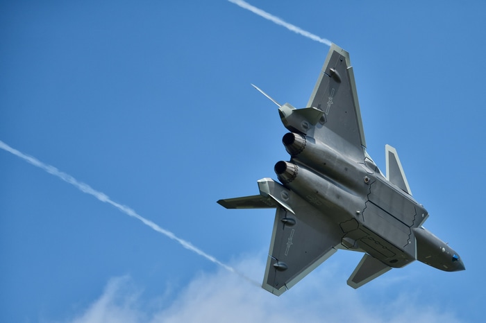 Chengdu J-20 fighter jet flying in the sky