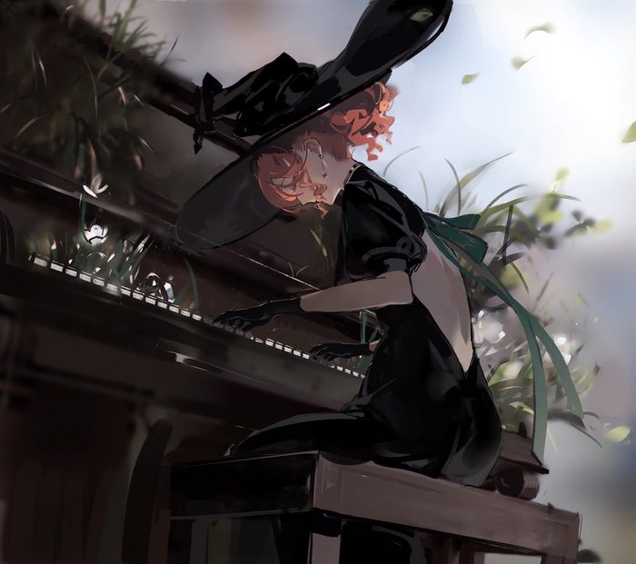 Woman in black dress playing piano