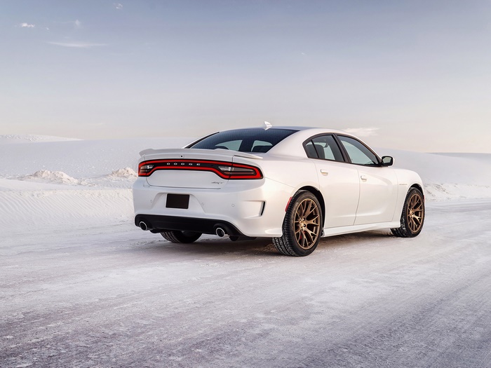 White Dodge Charger SRT Hellcat in a Snowy Landscape