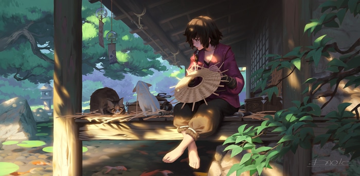 Woman weaving a basket with cats by a pond