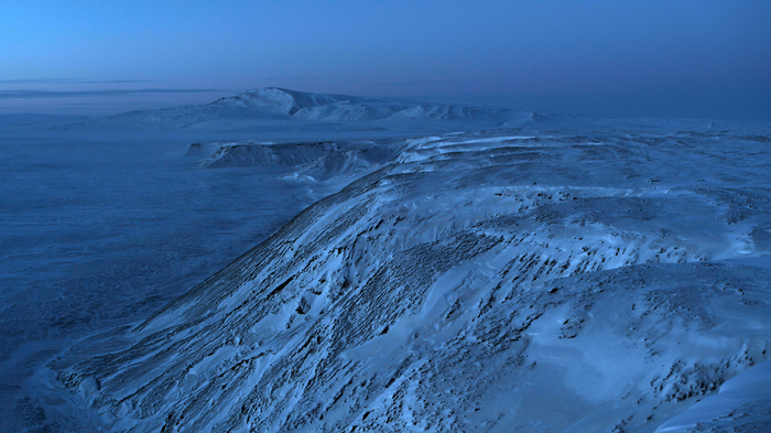 4K snow-covered mountains in winter landscape