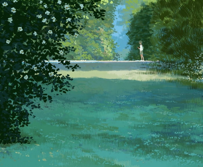 A person stands on a path surrounded by trees and grass