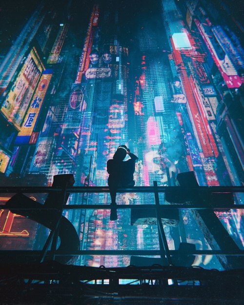 Silhouette of a person overlooking a futuristic cyberpunk city at night