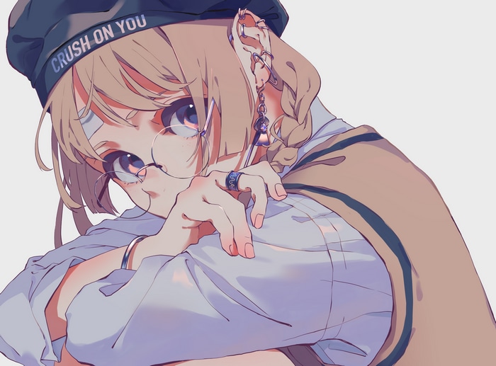 Girl with glasses and earrings wearing a beret