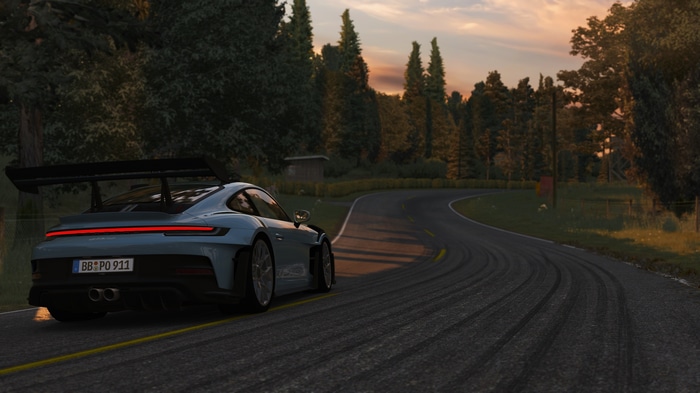 Porsche 992 GT3 RS on a winding road