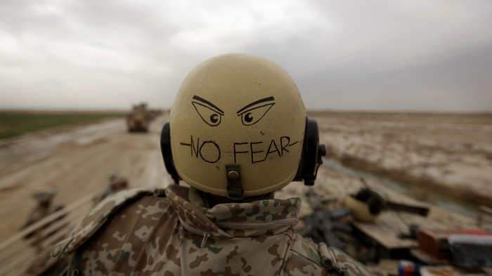 Soldier with "NO FEAR" helmet in Afghanistan