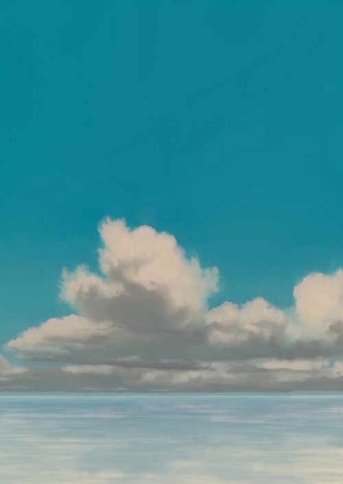 Blue sky with clouds over the ocean