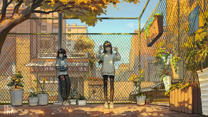 Two girls standing near a fence with plants