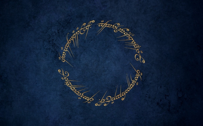 The Lord of the Rings inscription on a dark blue background
