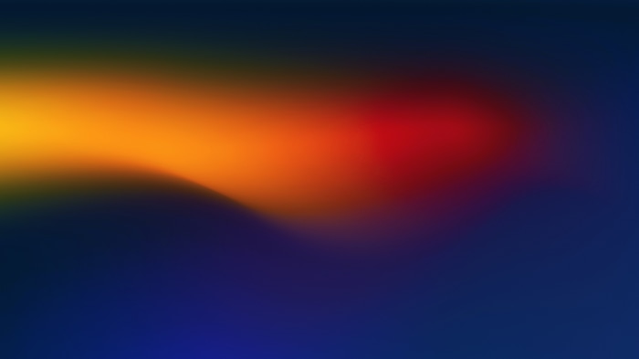 Abstract gradient with orange and red hues on blue