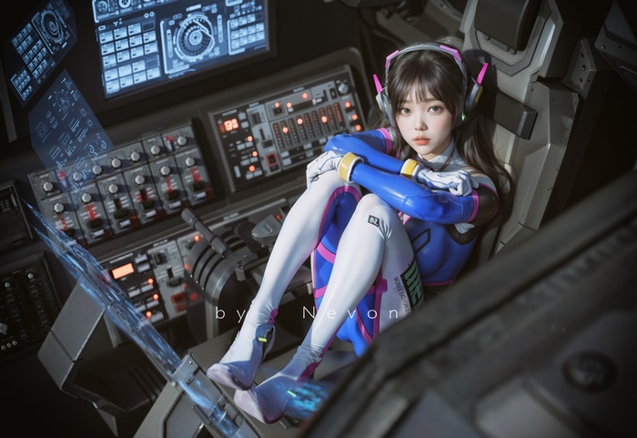 D.Va cosplay in a futuristic cockpit