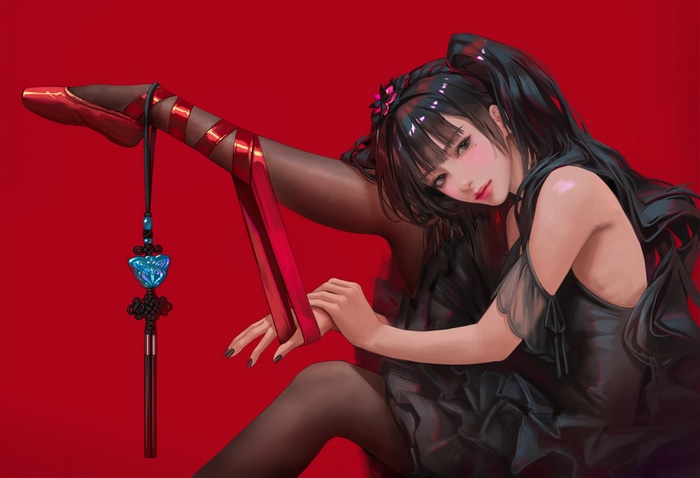 Woman in black dress with red ballet shoes