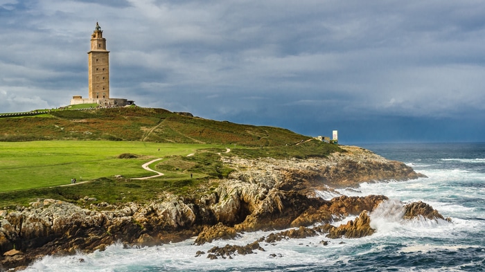 Torre de Hercules lighthouse on a rocky coast in Spain