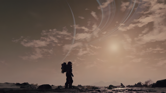 Starfield astronaut on alien planet with rings