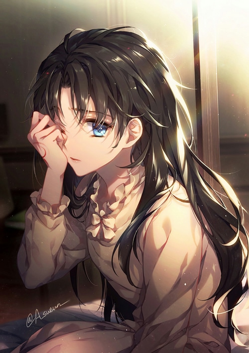 Girl in pajamas with one eye closed
