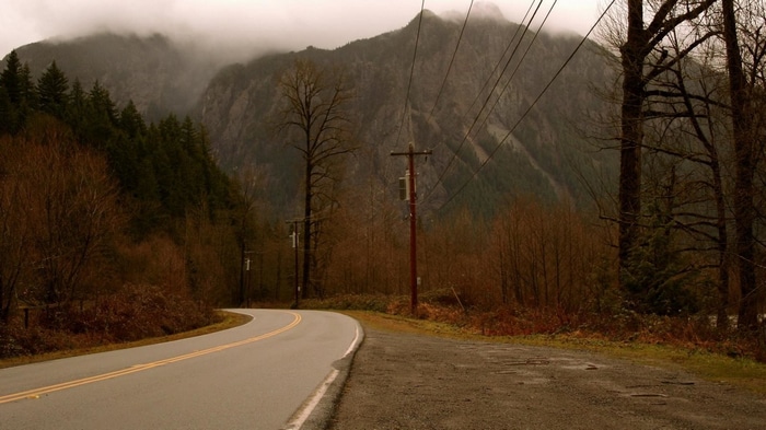 Twin Peaks road with mountains and mist