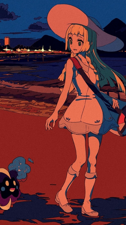Lillie and Nebby on a beach at dusk