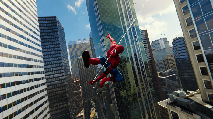 Spider-Man swings through a city skyline