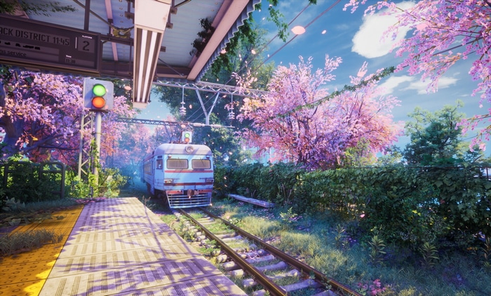 Train station with blooming cherry trees and a train
