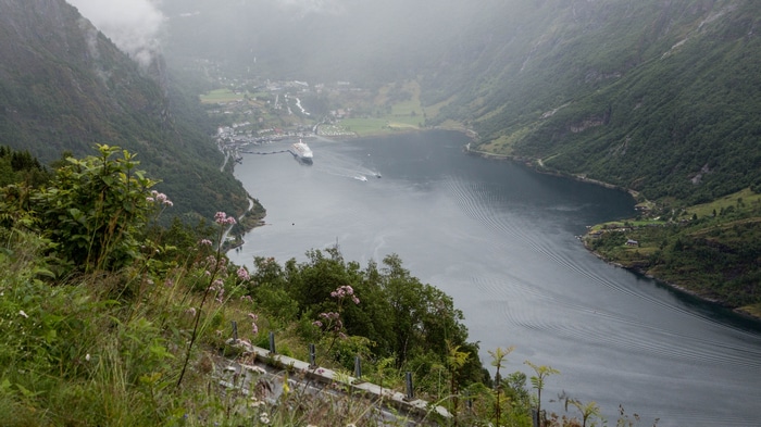 Fjord landscape in Norway with a cruise ship