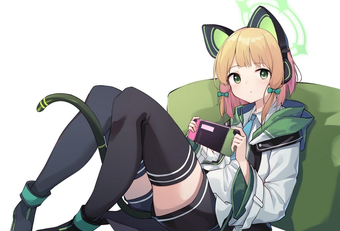 Cat girl playing Nintendo Switch on a green couch