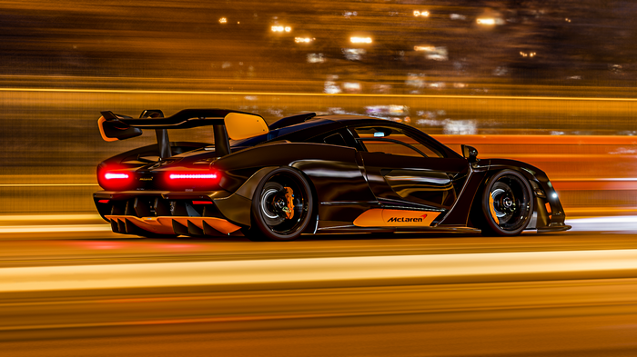 McLaren Senna driving at night with blurred lights